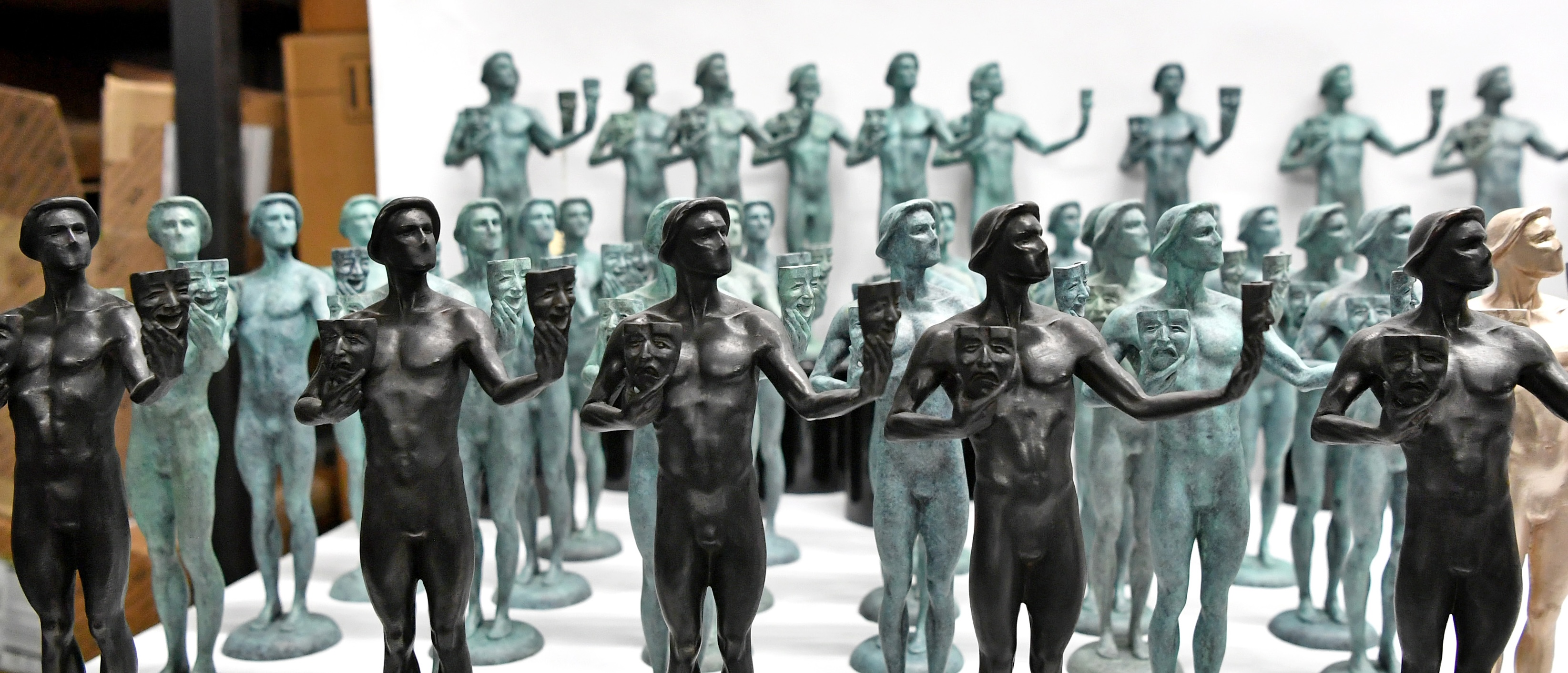collection of Actor Awards statuettes