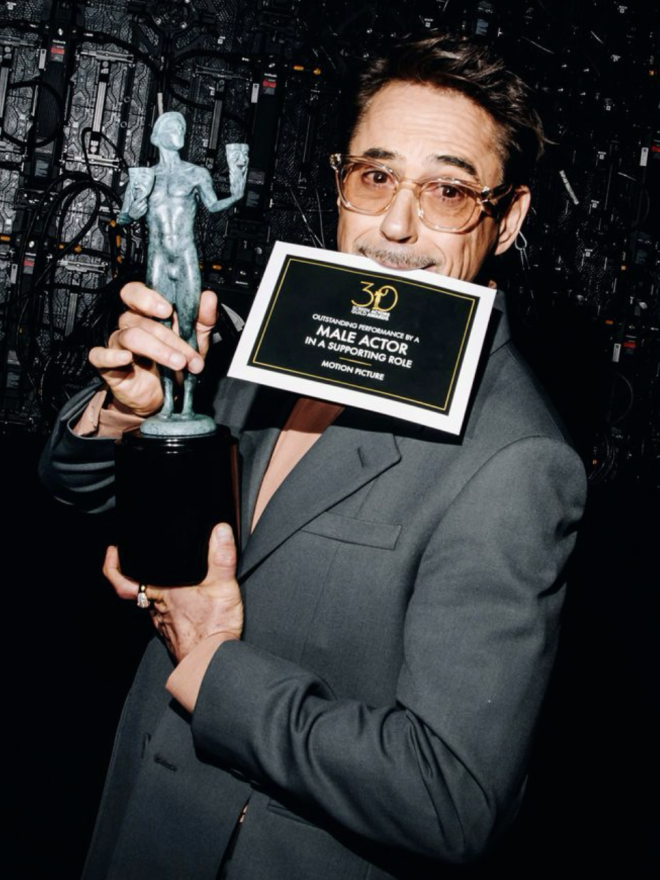Robert Downey Jr. backstage with his Actor statuette at the 32nd Annual Actor Awards